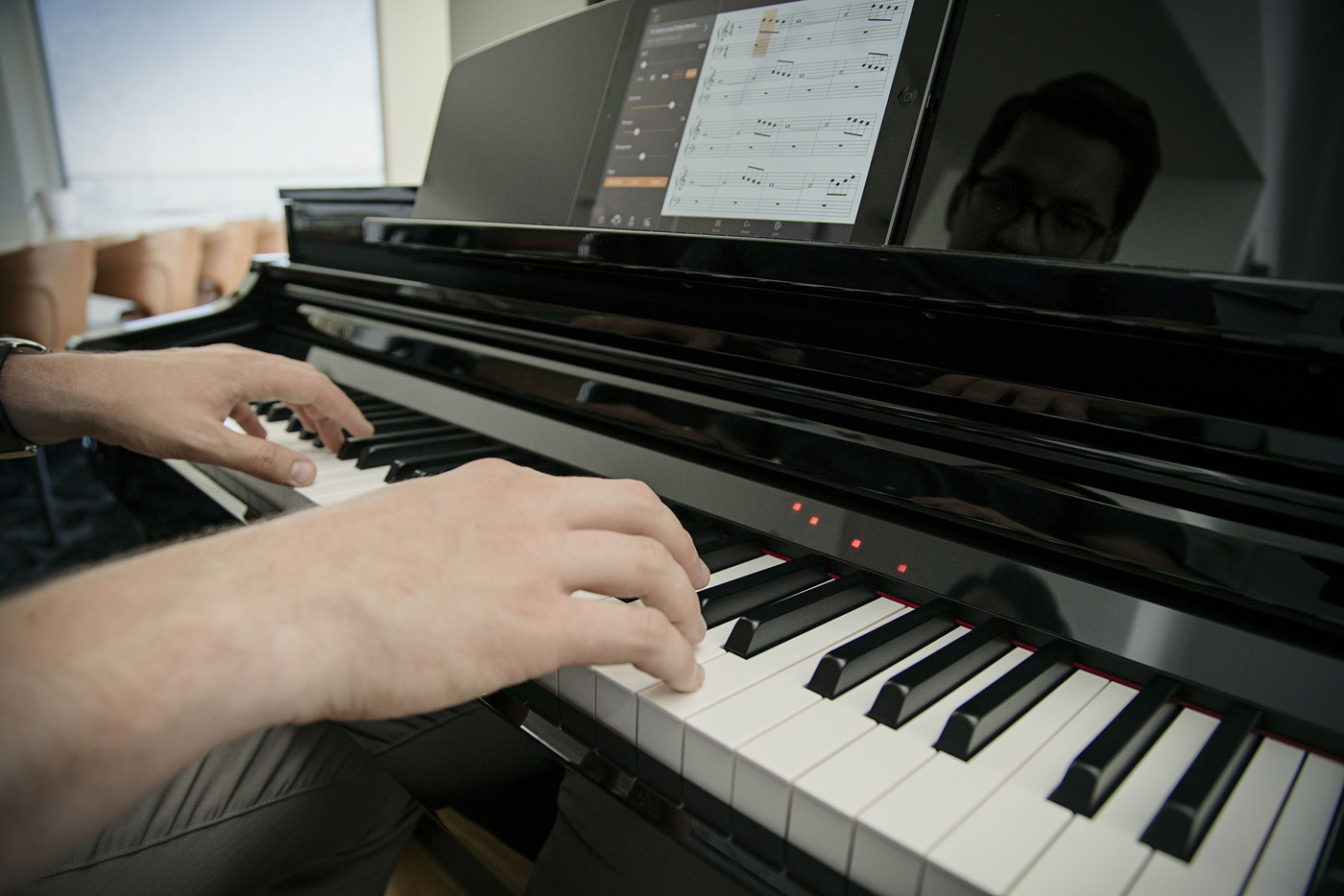 A pianist playing the CSP Series Smart Piano