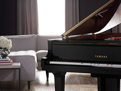 Photo of a Disklavier Enspire Pro in a living room